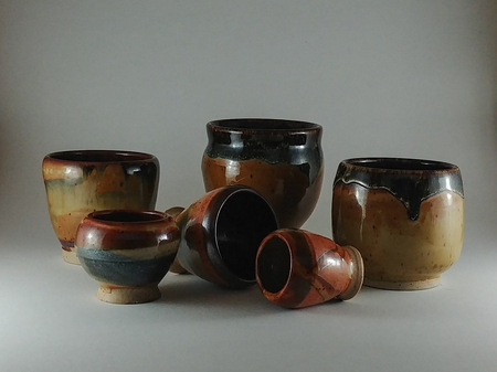 Group of small mugs and vases